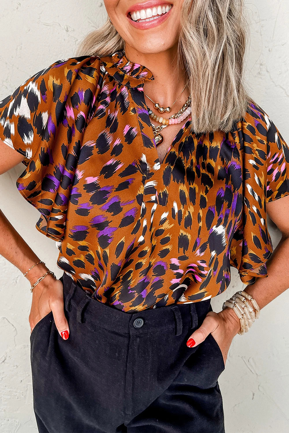 Orange Cheetah Short Sleeve Slit V Neck Blouse